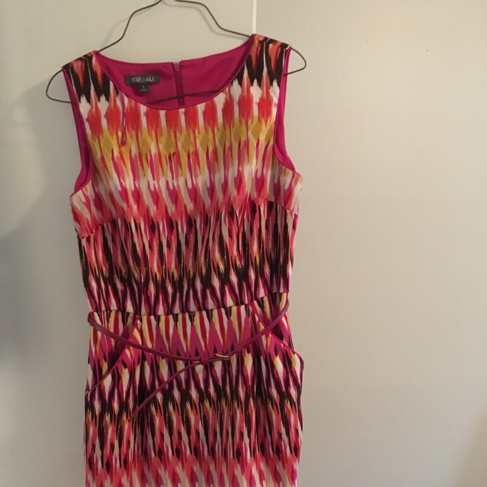 Multi colored midi dress with pockets and belt.